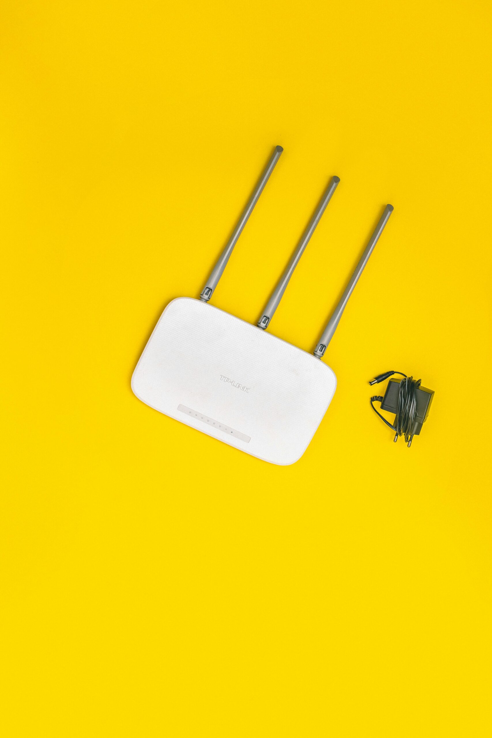 Photo by Aditya Singh: https://www.pexels.com/photo/wifi-router-on-yellow-background-4218546/