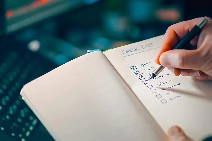 Cyber Essentials Checklist Photo by Jakub Zerdzicki: https://www.pexels.com/photo/writing-in-notebook-with-checklist-for-task-management-35719566/
